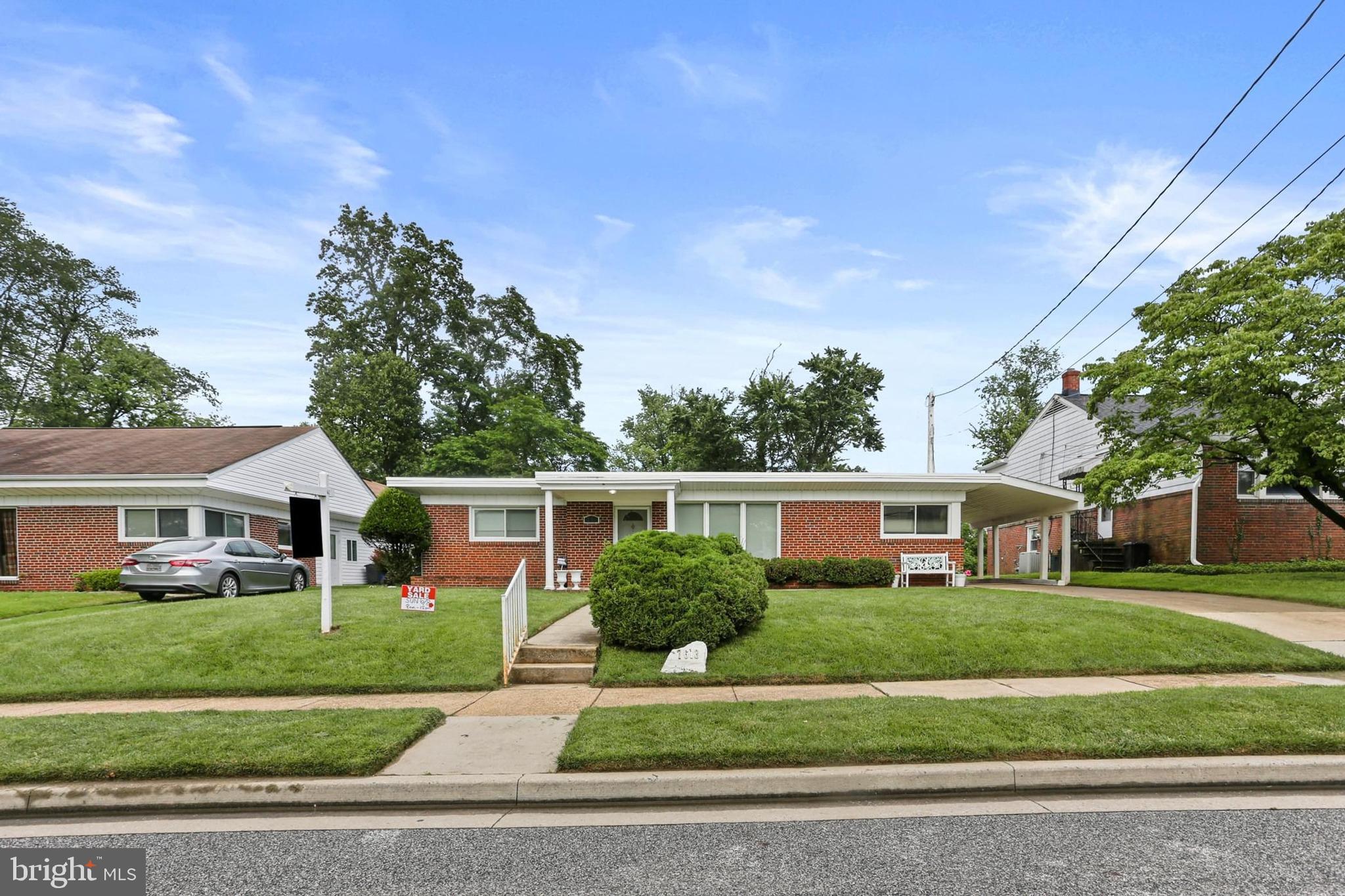 front view of house with a yard