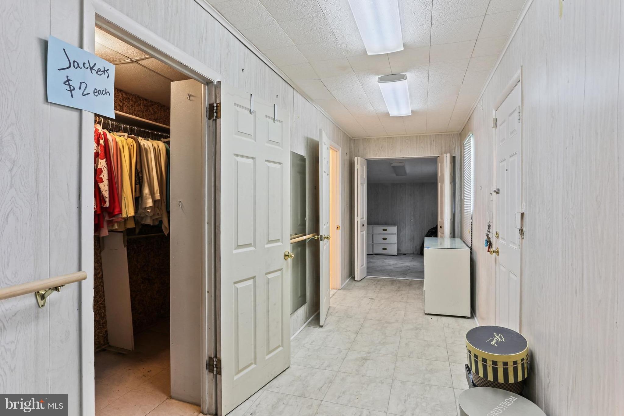 7613 Carla Road Baltimore, MD 21208 - Photo 16 of 24 a view of a hallway with painted walls