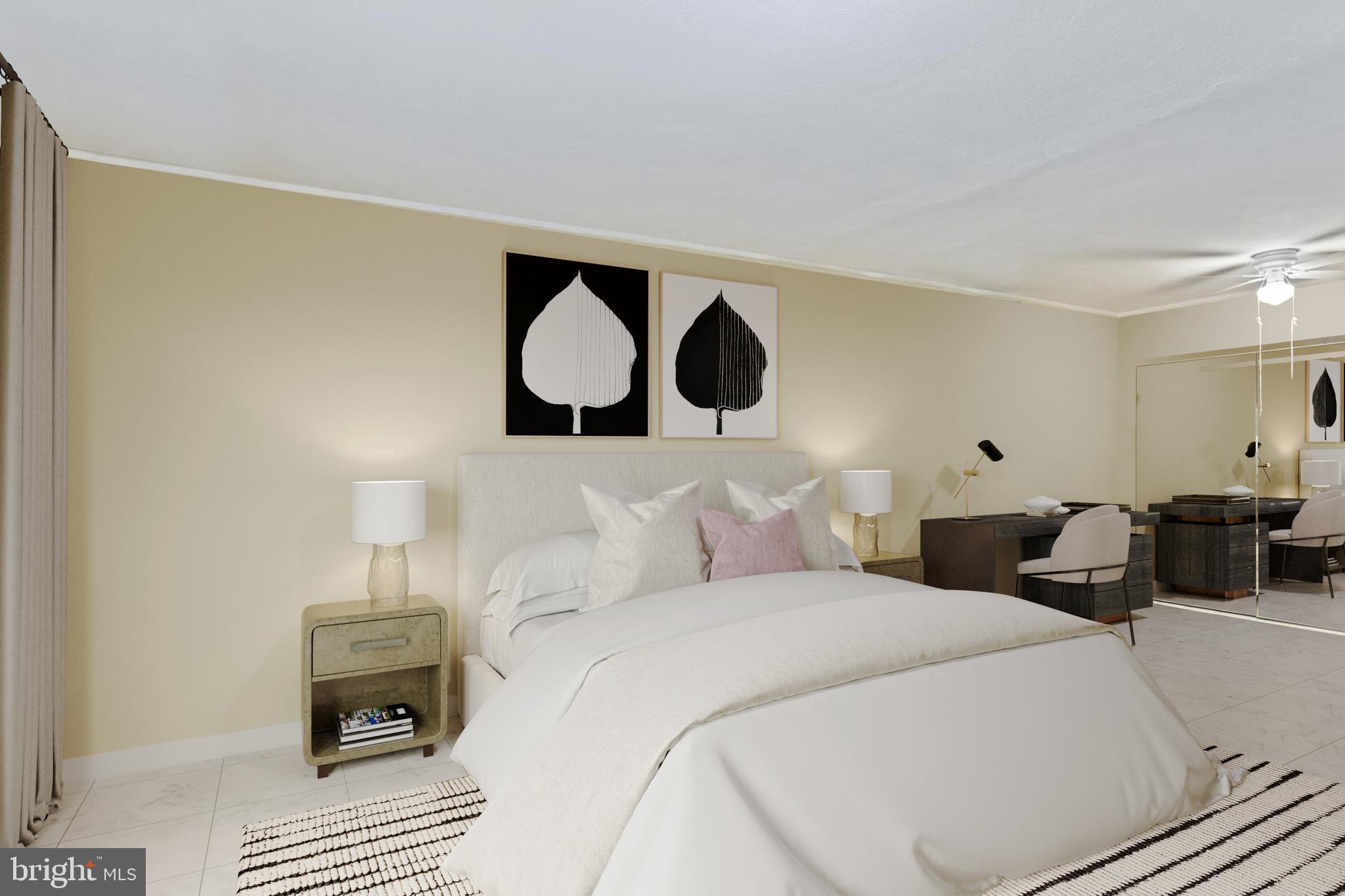 7613 Carla Road Baltimore, MD 21208 - Photo 5 of 24 a bedroom with a bed and a lamp