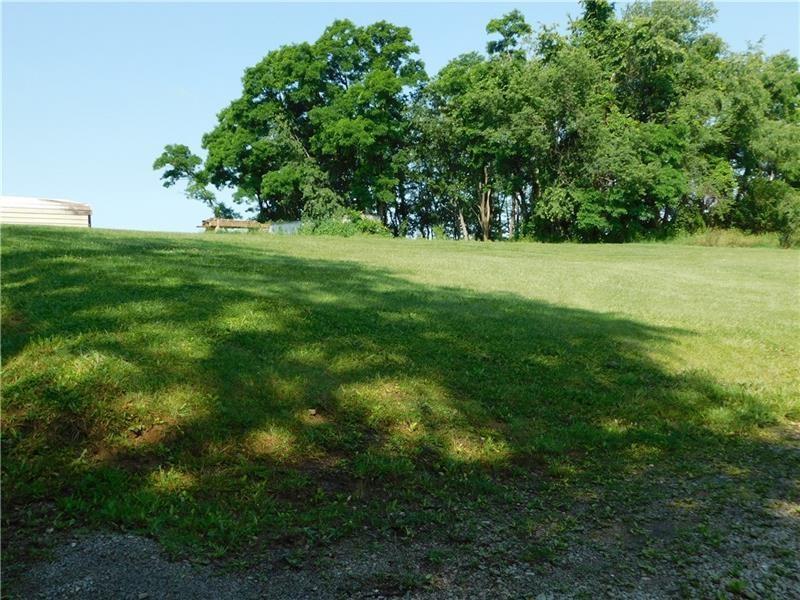 577 Woodside Old Frame Road Smithfield, PA 15478 - Photo 9 of 49 a view of green field with trees in the background