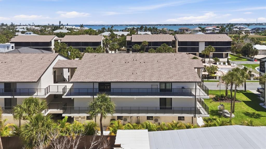 2729 North Beach Road, Unit 211 Englewood, FL 34223 - Photo 42 of 51 an aerial view of a house