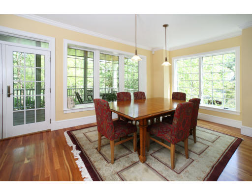 99 Rawson Road Brookline, MA 02445 - Photo 3 of 6 a view of a dining room with furniture window and wooden floor