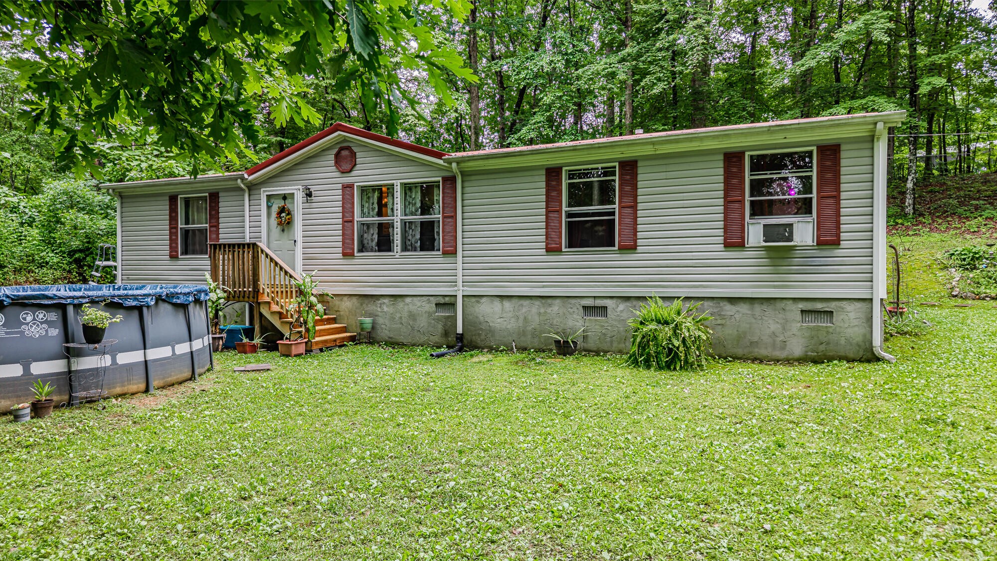 1426 Nebo Road Ten Mile, TN 37880 - Photo 1 of 1 a view of a house with a yard and furniture
