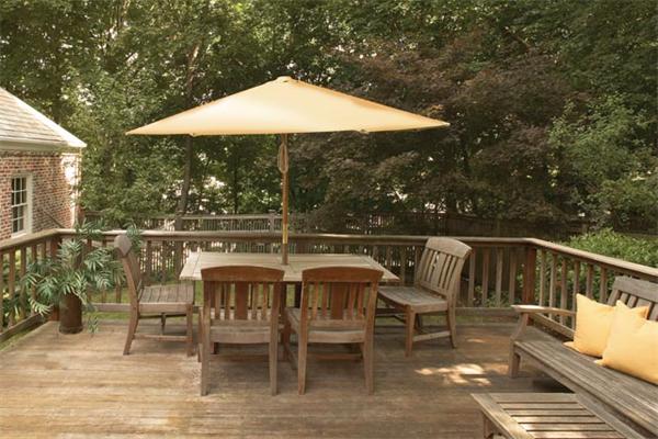 171 Reservoir Road Brookline, MA 02467 - Photo 8 of 8 a balcony with wooden floor table and chairs