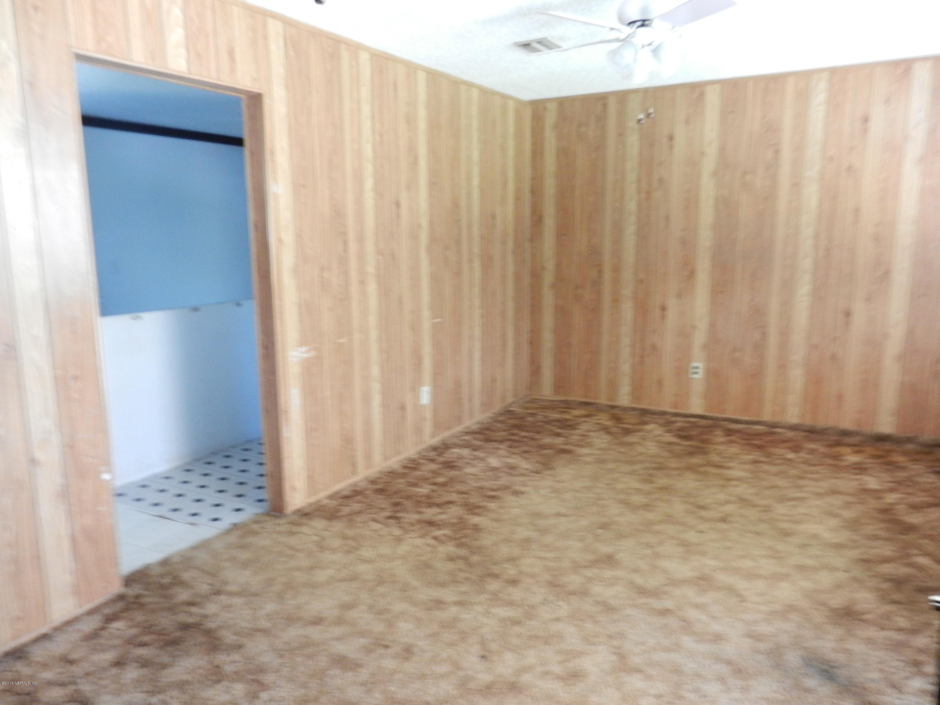 86232 Pages Dairy Road Yulee, FL 32097 - Photo 3 of 13 a view of a room with a window