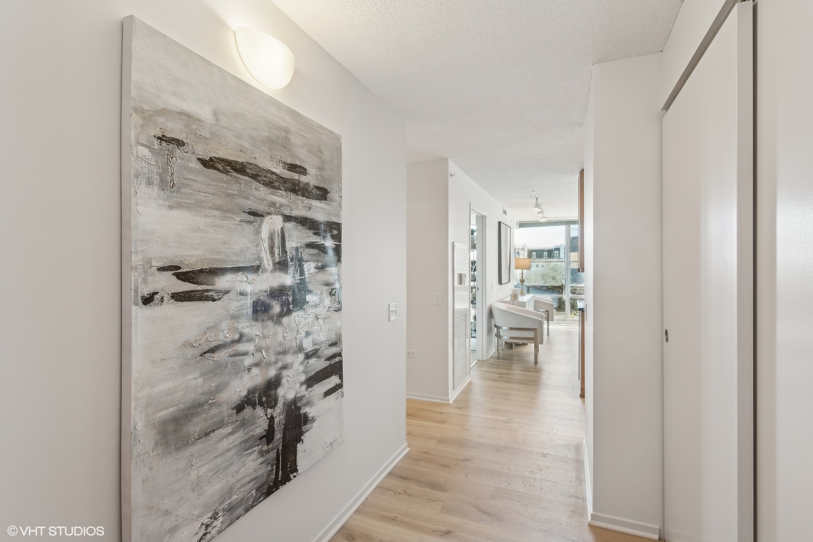 800 Elgin Road, Unit 511 Evanston, IL 60201 - Photo 3 of 29 a bathroom with a glass shower door