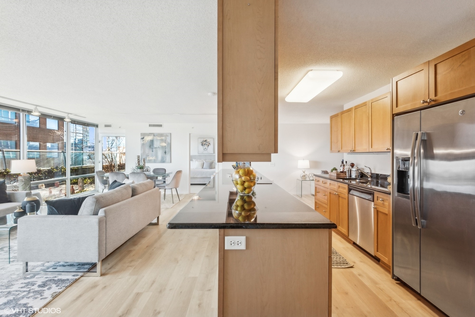 800 Elgin Road, Unit 511 Evanston, IL 60201 - Photo 6 of 29 a kitchen with counter top space cabinets and stainless steel appliances