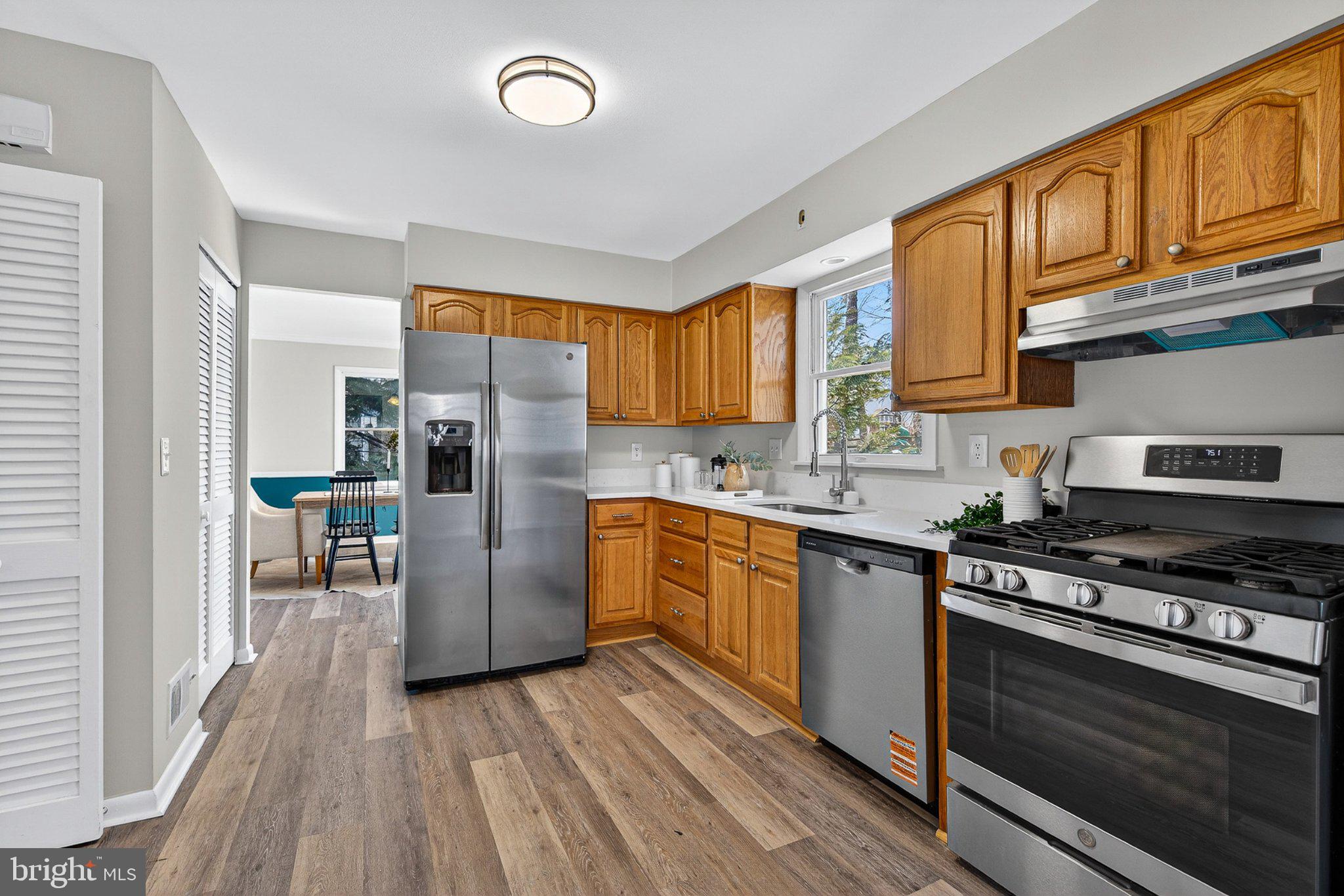 1207 White Mills Road Catonsville, MD 21228 - Photo 13 of 38 Modern kitchen with warm wood accents.