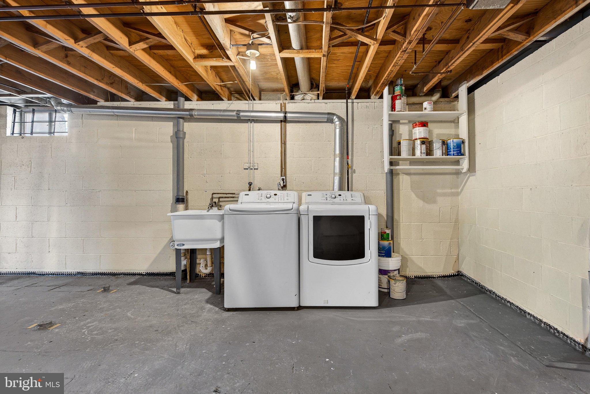 1207 White Mills Road Catonsville, MD 21228 - Photo 34 of 38 Spacious laundry area with utility sink.