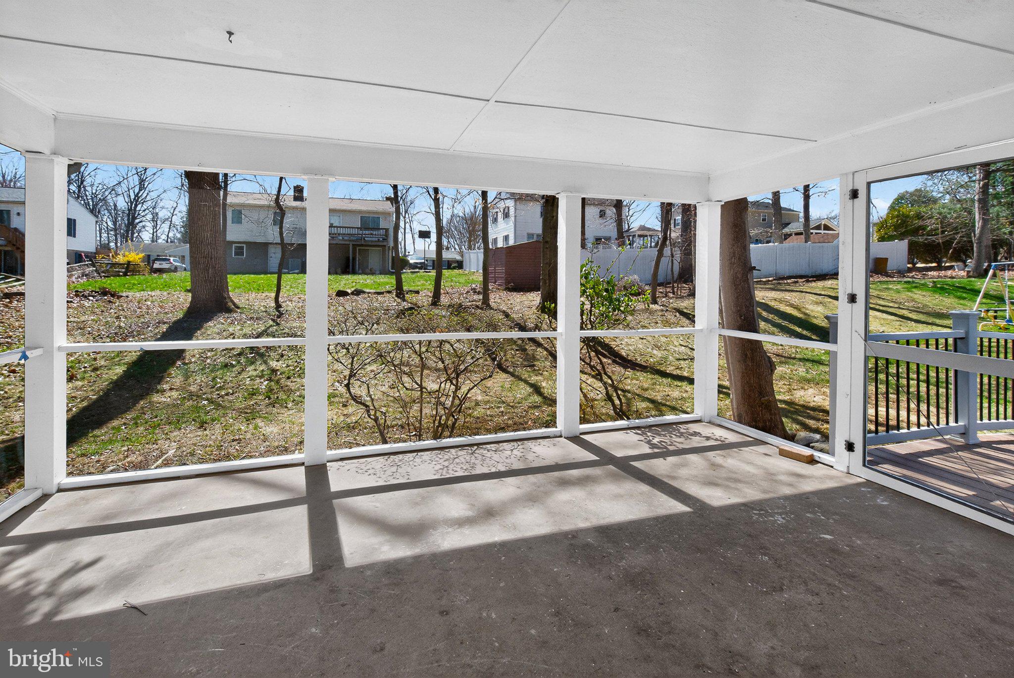 1207 White Mills Road Catonsville, MD 21228 - Photo 35 of 38 Serene screened porch with nature views.