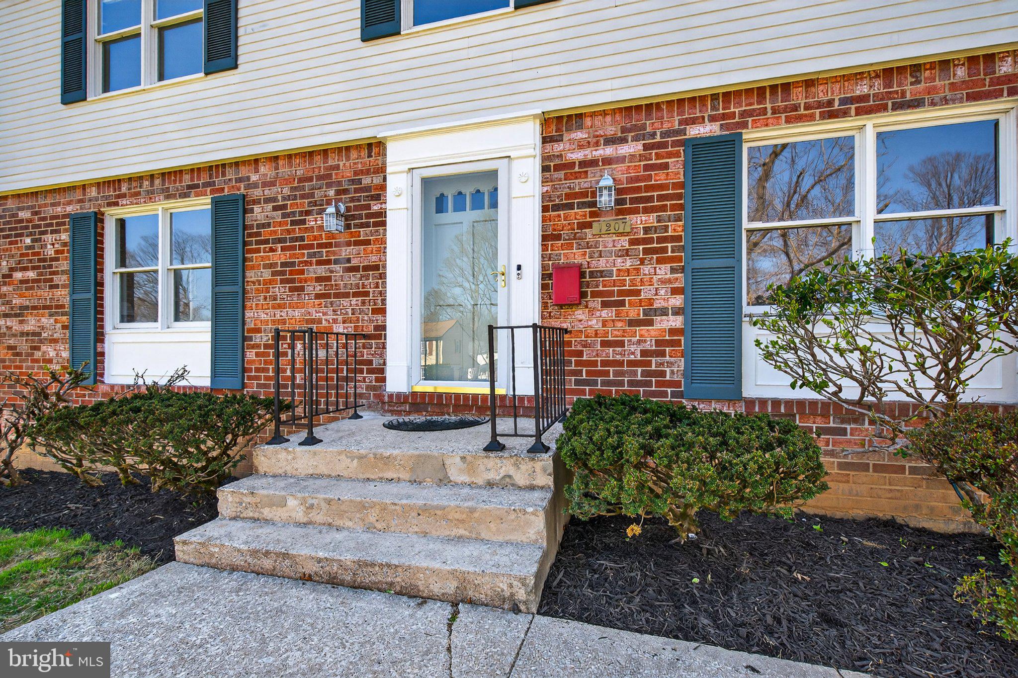 1207 White Mills Road Catonsville, MD 21228 - Photo 5 of 38 Charming brick entryway with greenery.