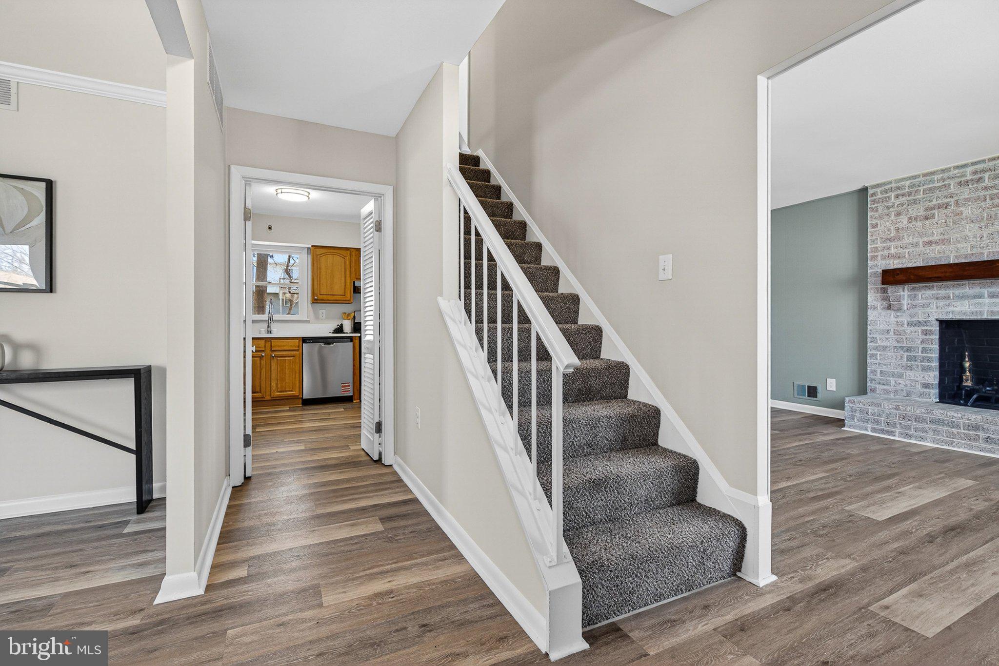 1207 White Mills Road Catonsville, MD 21228 - Photo 6 of 38 Inviting entryway with staircase charm.