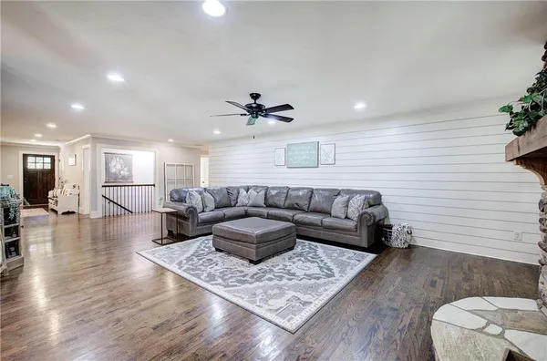 a kitchen with stainless steel appliances a stove and a microwave