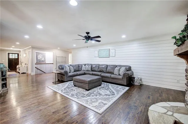 a kitchen with stainless steel appliances a stove and a microwave