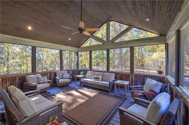 a bedroom with a bed and a television