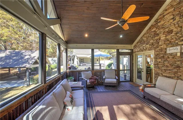 a spacious bedroom with a bed and a fireplace