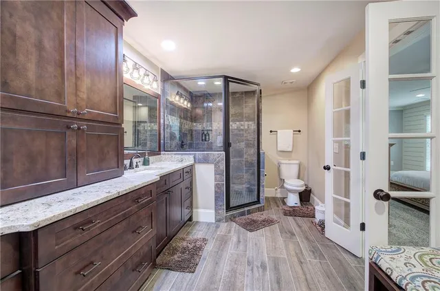 a view of a house with backyard porch and sitting area