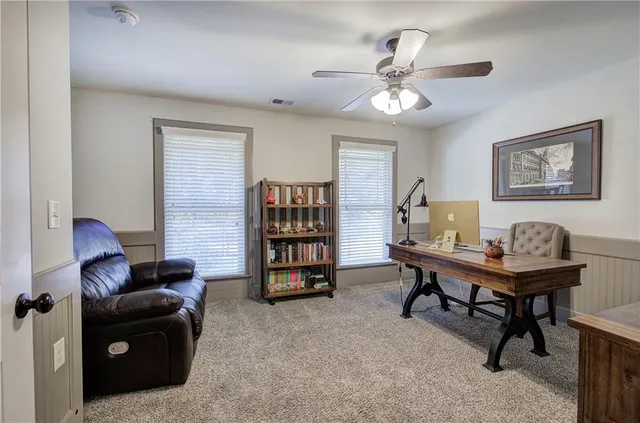 a view of a livingroom with furniture and wooden floor