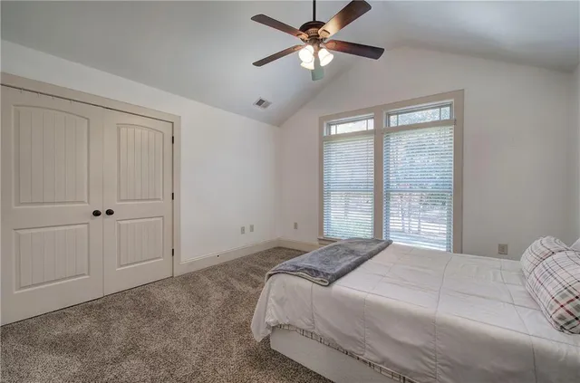a view of a dining room with furniture wooden floor and a rug