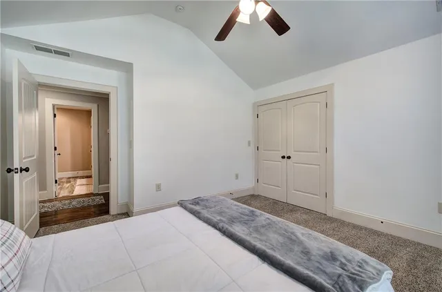 a kitchen with stainless steel appliances granite countertop a sink and stove top oven