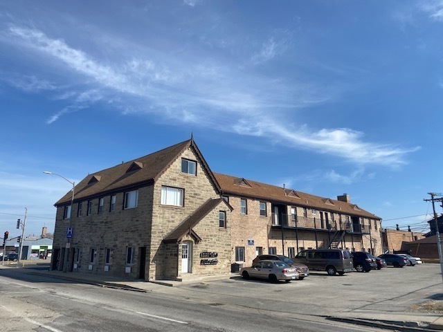 171 25th Avenue, Unit 8 Melrose Park, IL 60160 - Photo 16 of 16 a view of building with car parked
