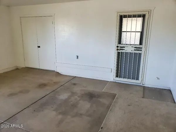 an empty room with windows