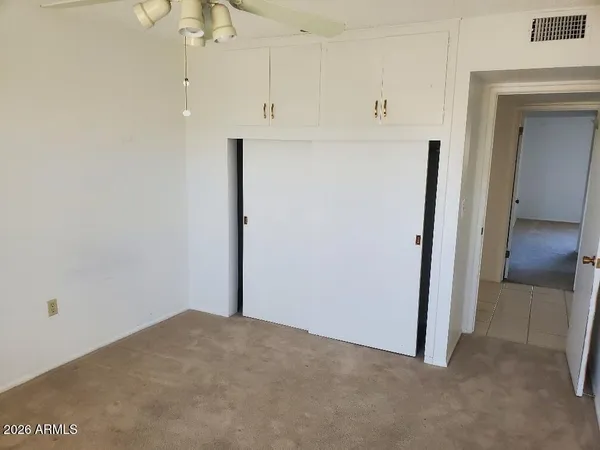 a view of a room with an empty space