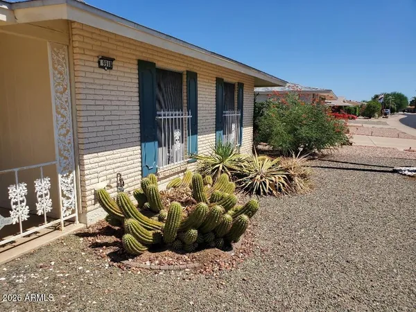 a view of a backyard with a patio