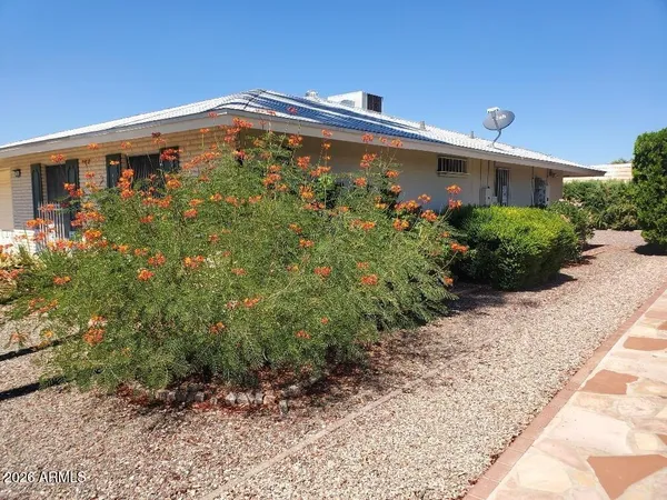 a front view of house with yard