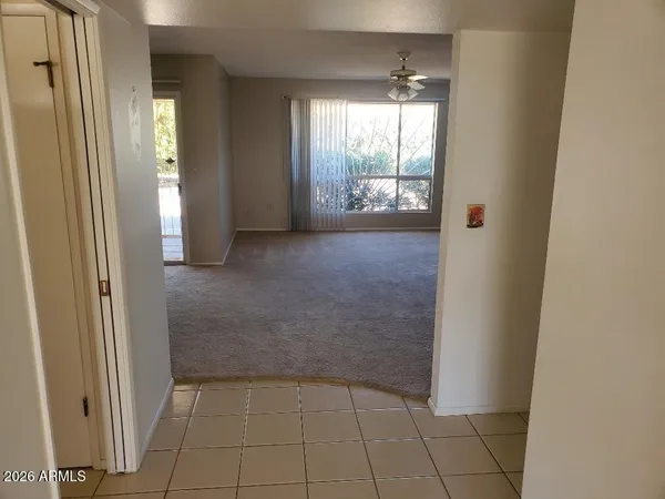 a view of an empty room and window