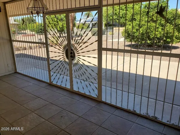 a view of a balcony with a pot