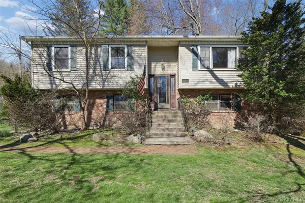 a front view of house with yard