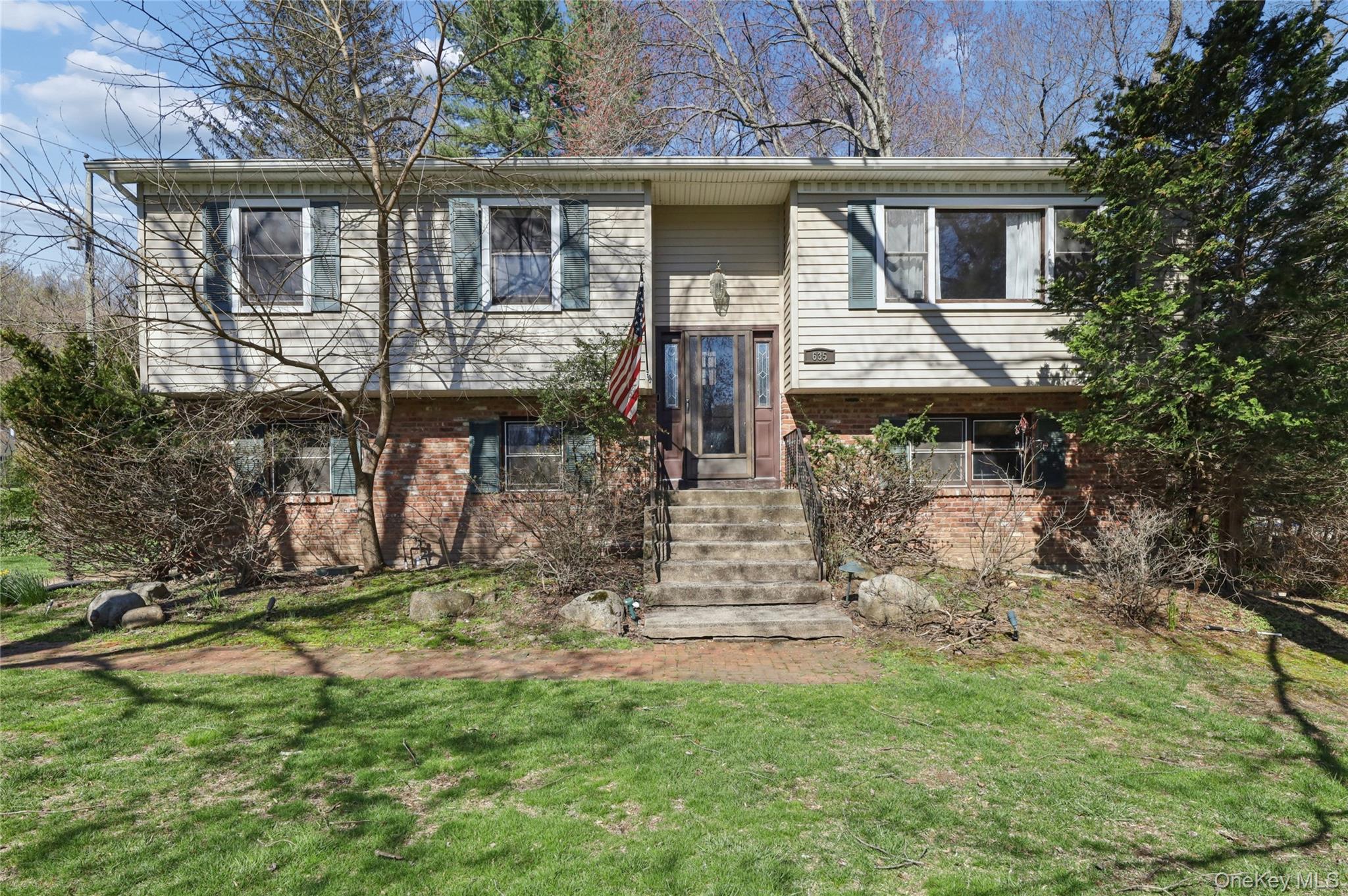 a front view of house with yard