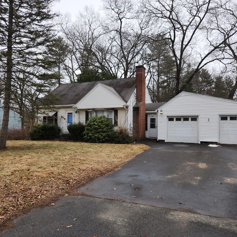 a house with trees in front of it