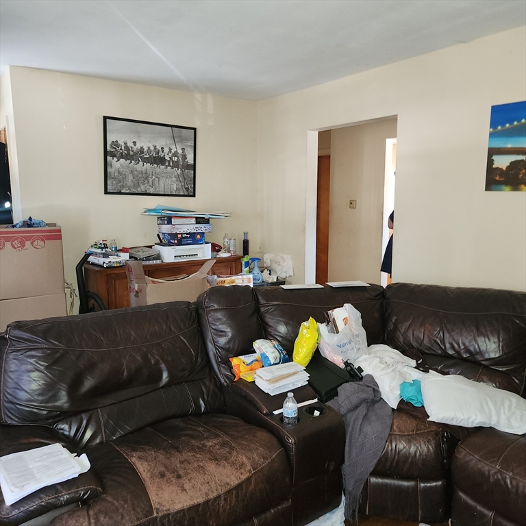 514 Dewey Street West Springfield, MA 01089 - Photo 14 of 42 a living room with furniture and a couch
