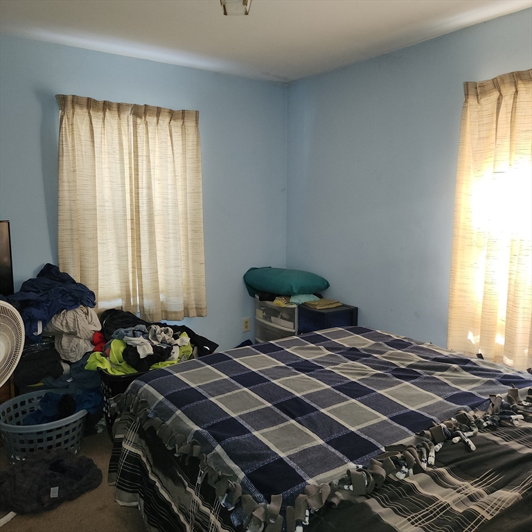 514 Dewey Street West Springfield, MA 01089 - Photo 26 of 42 a bedroom with a bed and a window