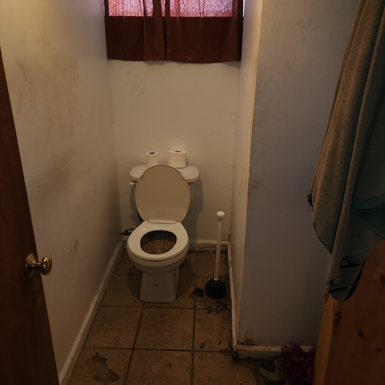 514 Dewey Street West Springfield, MA 01089 - Photo 34 of 42 a bathroom with a toilet