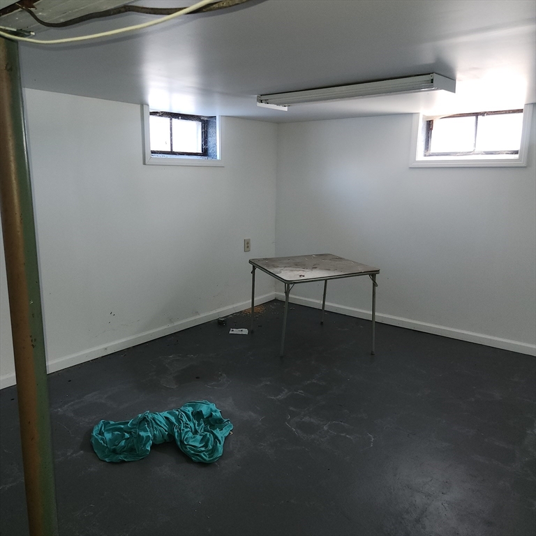 514 Dewey Street West Springfield, MA 01089 - Photo 36 of 42 an empty room with a window