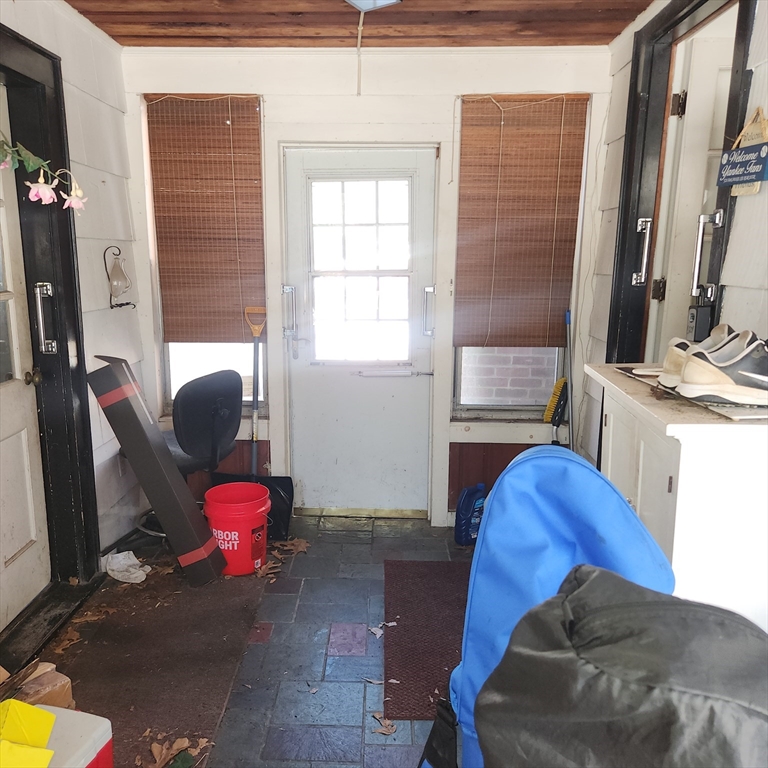 514 Dewey Street West Springfield, MA 01089 - Photo 4 of 42 a living room with furniture window and a flat screen tv