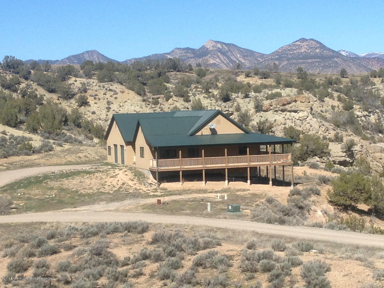 551 Deer Run Trail Rifle, CO 81650 - Photo 1 of 20 front view of a house with a mountain