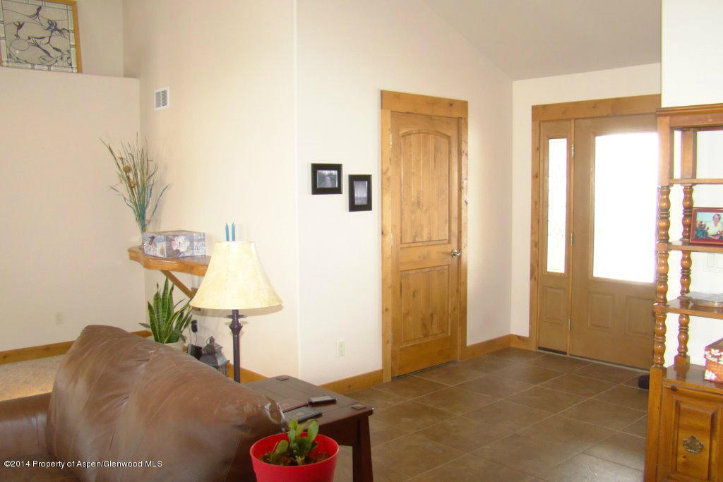 551 Deer Run Trail Rifle, CO 81650 - Photo 9 of 20 a living room with furniture and a window