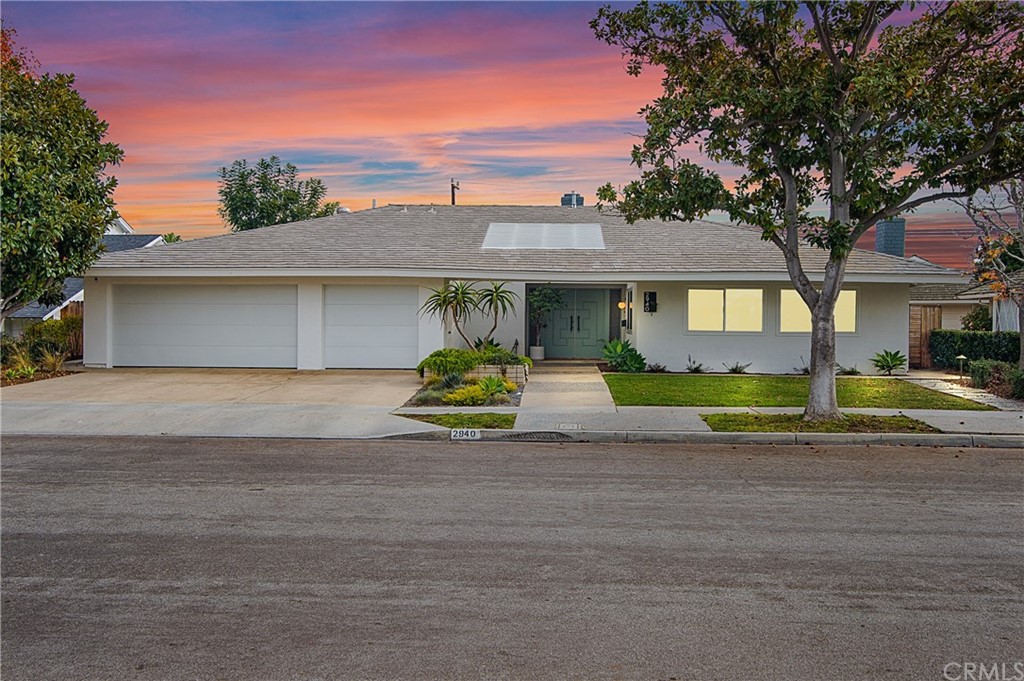 2940 Java Road Costa Mesa, CA 92626 - Photo 2 of 28 a front view of a house with a yard and potted plants