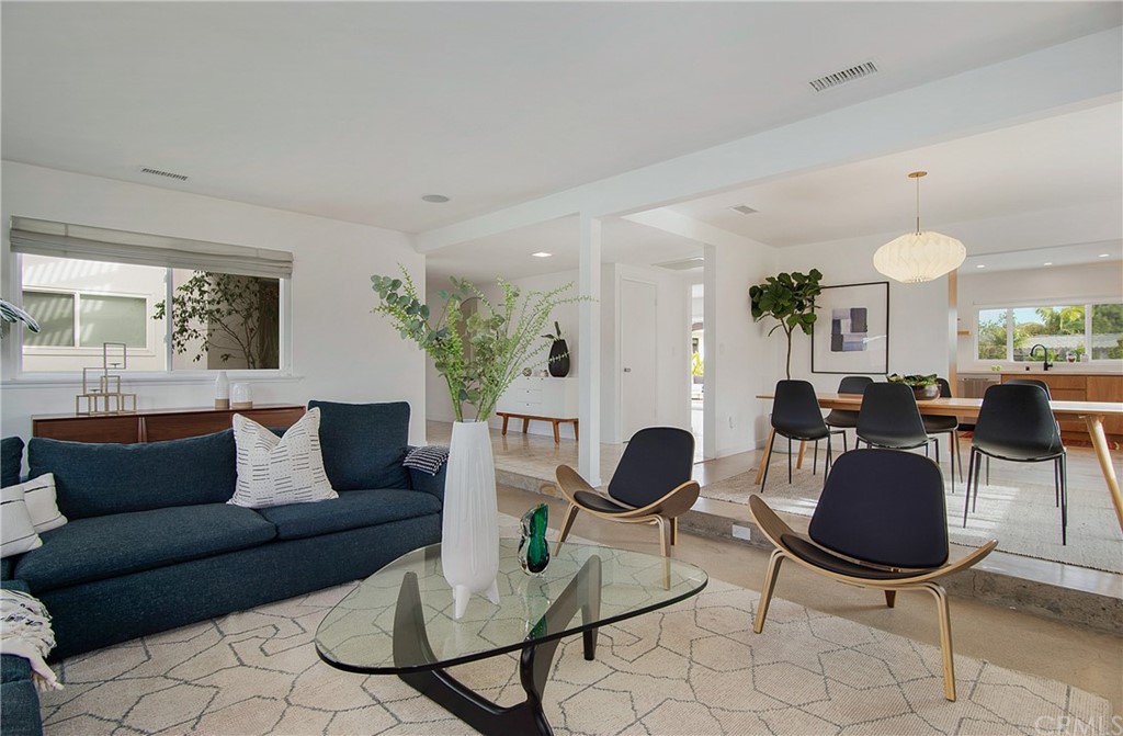 2940 Java Road Costa Mesa, CA 92626 - Photo 6 of 28 a living room with furniture kitchen and a table