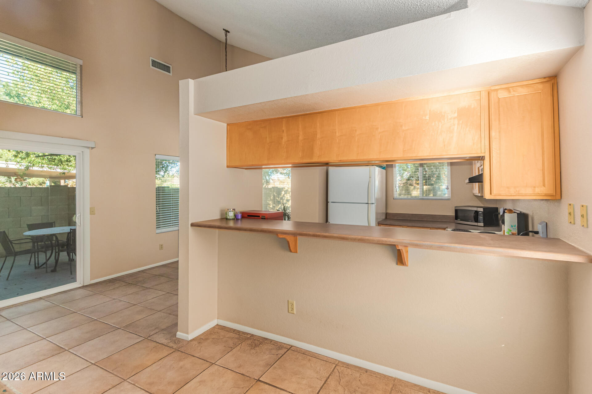 3904 West Butler Street Chandler, AZ 85226 - Photo 12 of 30 a view of a kitchen with a sink and a window