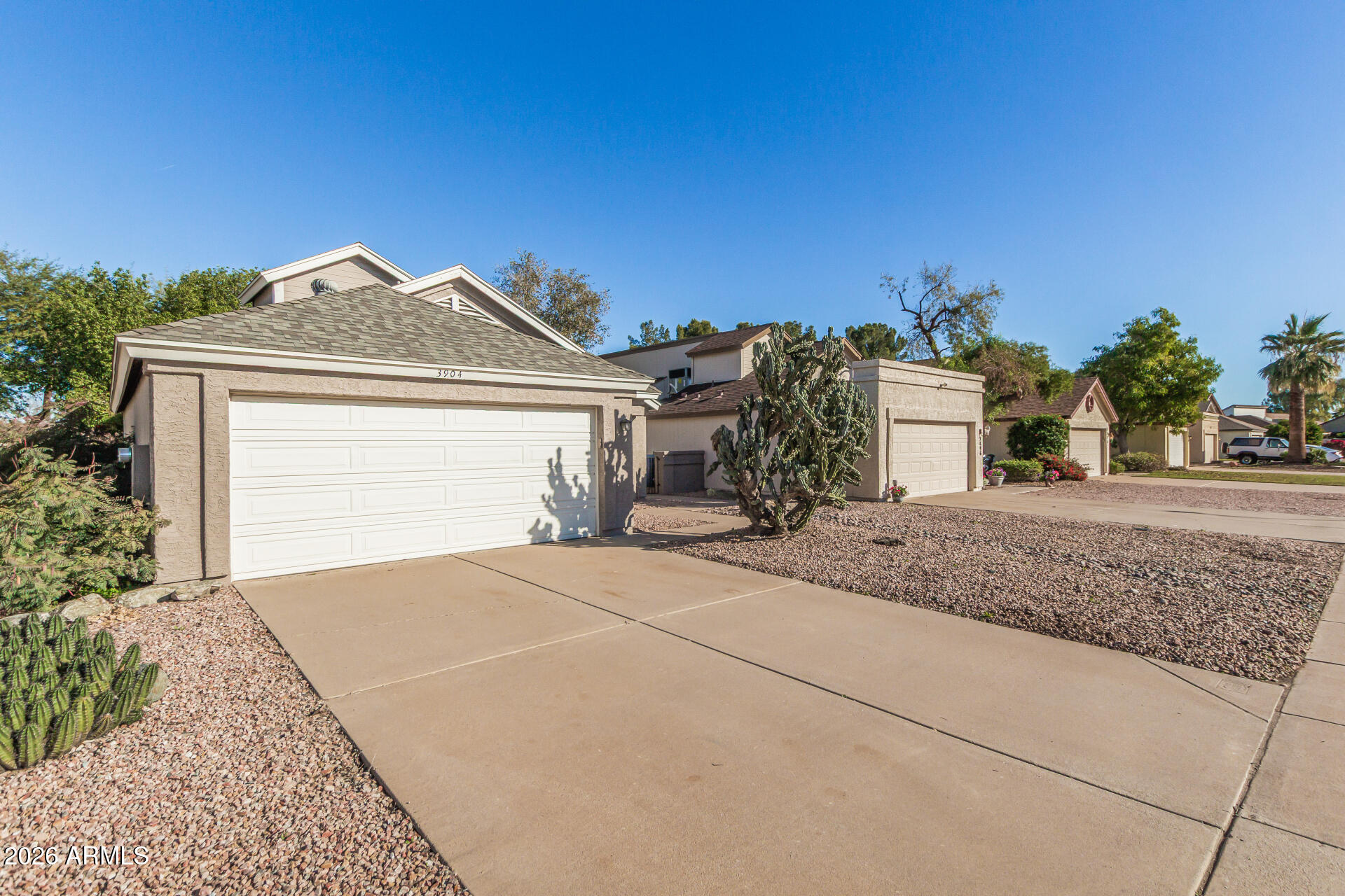 3904 West Butler Street Chandler, AZ 85226 - Photo 2 of 30 a front view of a house with a yard