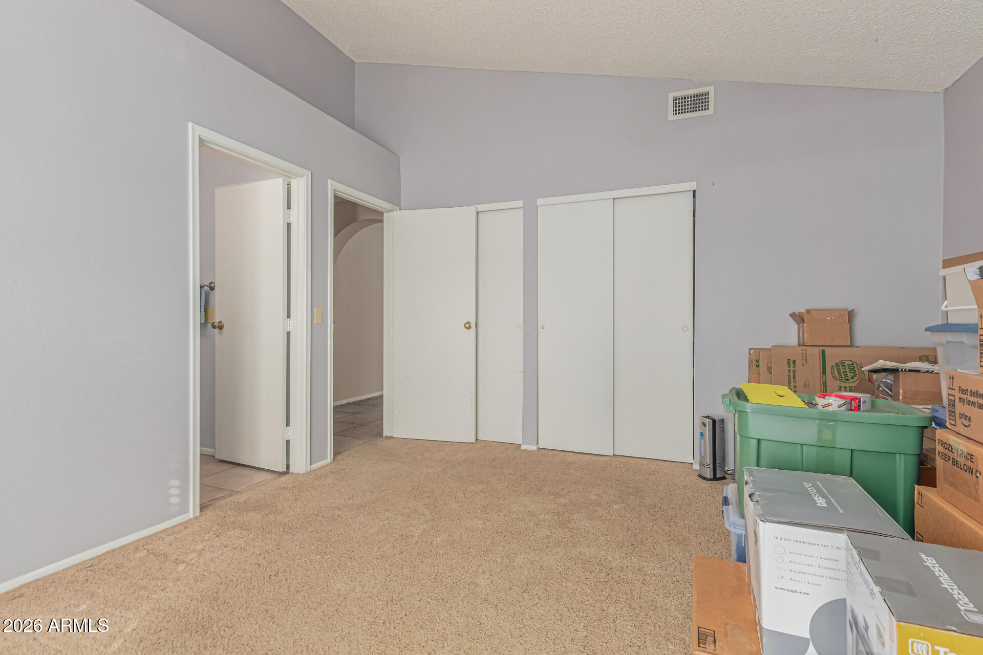 3904 West Butler Street Chandler, AZ 85226 - Photo 23 of 30 a bedroom with a bed and a workspace