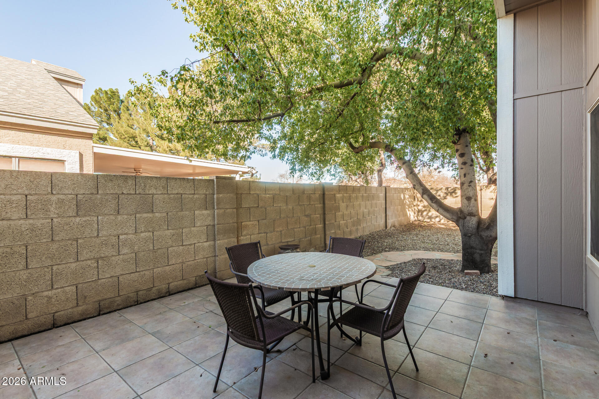 3904 West Butler Street Chandler, AZ 85226 - Photo 25 of 30 a view of a backyard with table and chairs