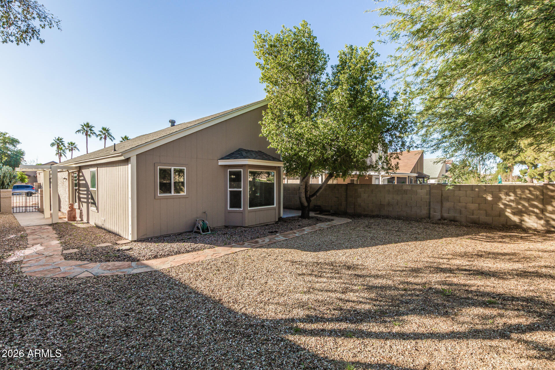 3904 West Butler Street Chandler, AZ 85226 - Photo 28 of 30 a view of a house with a yard