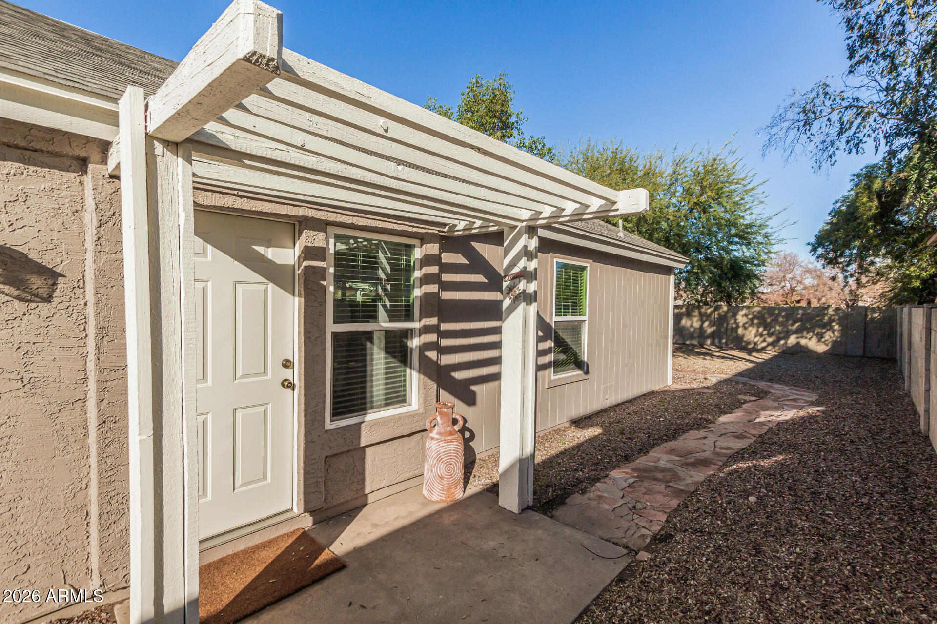 3904 West Butler Street Chandler, AZ 85226 - Photo 6 of 30 a view of house with hallway and wooden fence