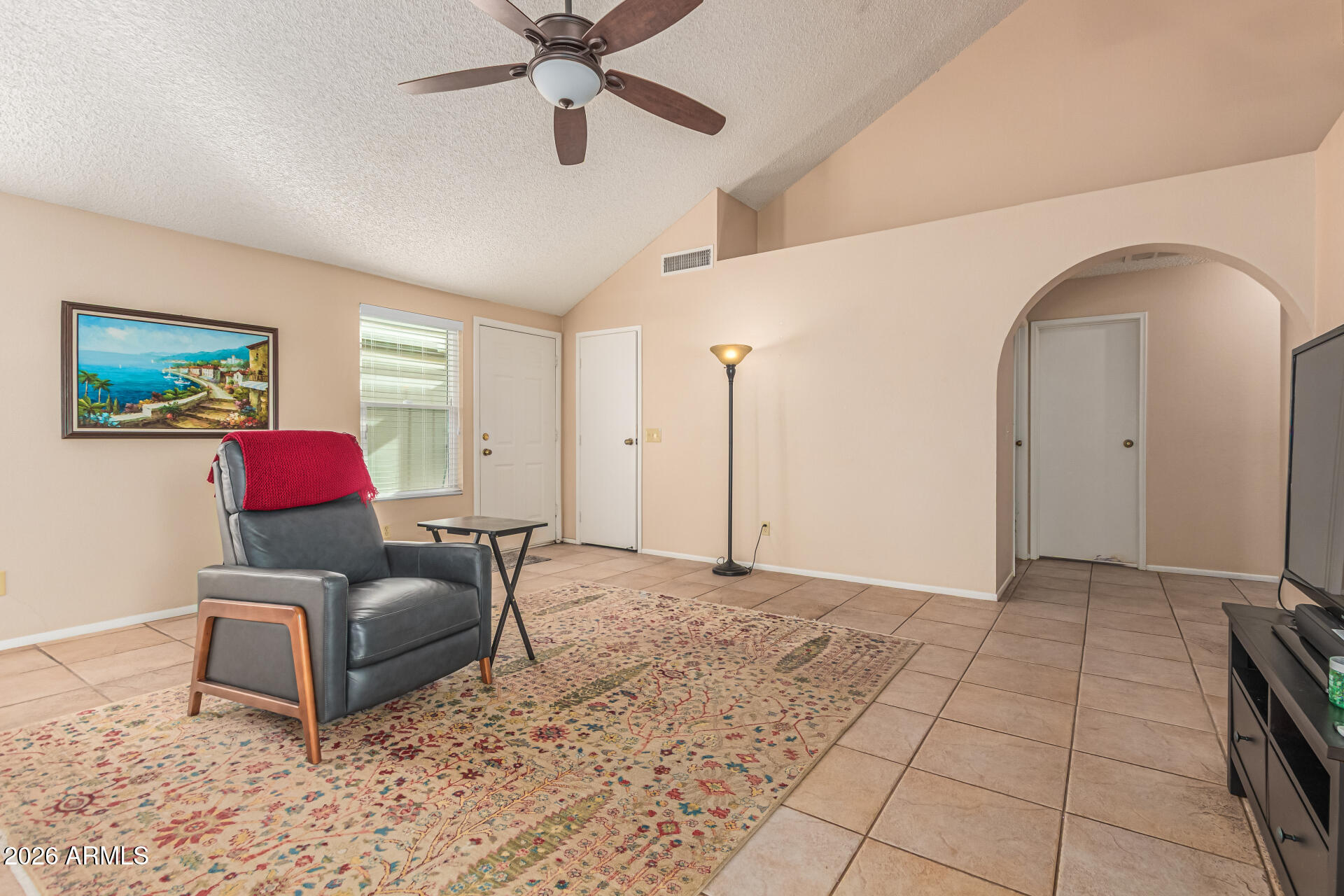 3904 West Butler Street Chandler, AZ 85226 - Photo 8 of 30 a living room with furniture and a rug